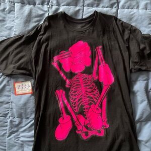 KAWS Black Tee with Pink Skeleton Design